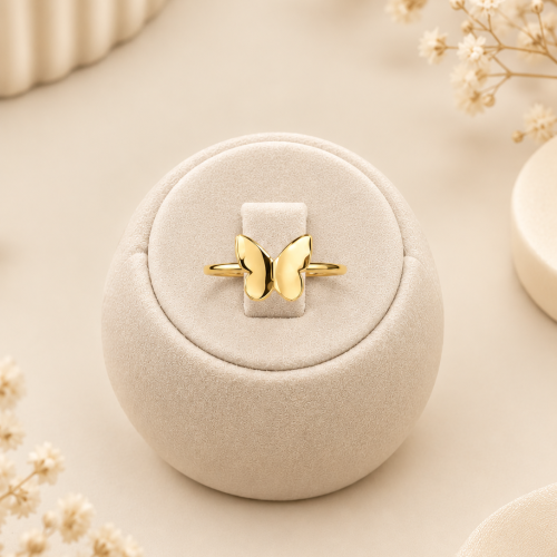 Golden Butterfly Ring on Ivory Stand